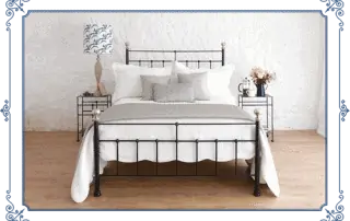 black iron bed with frame