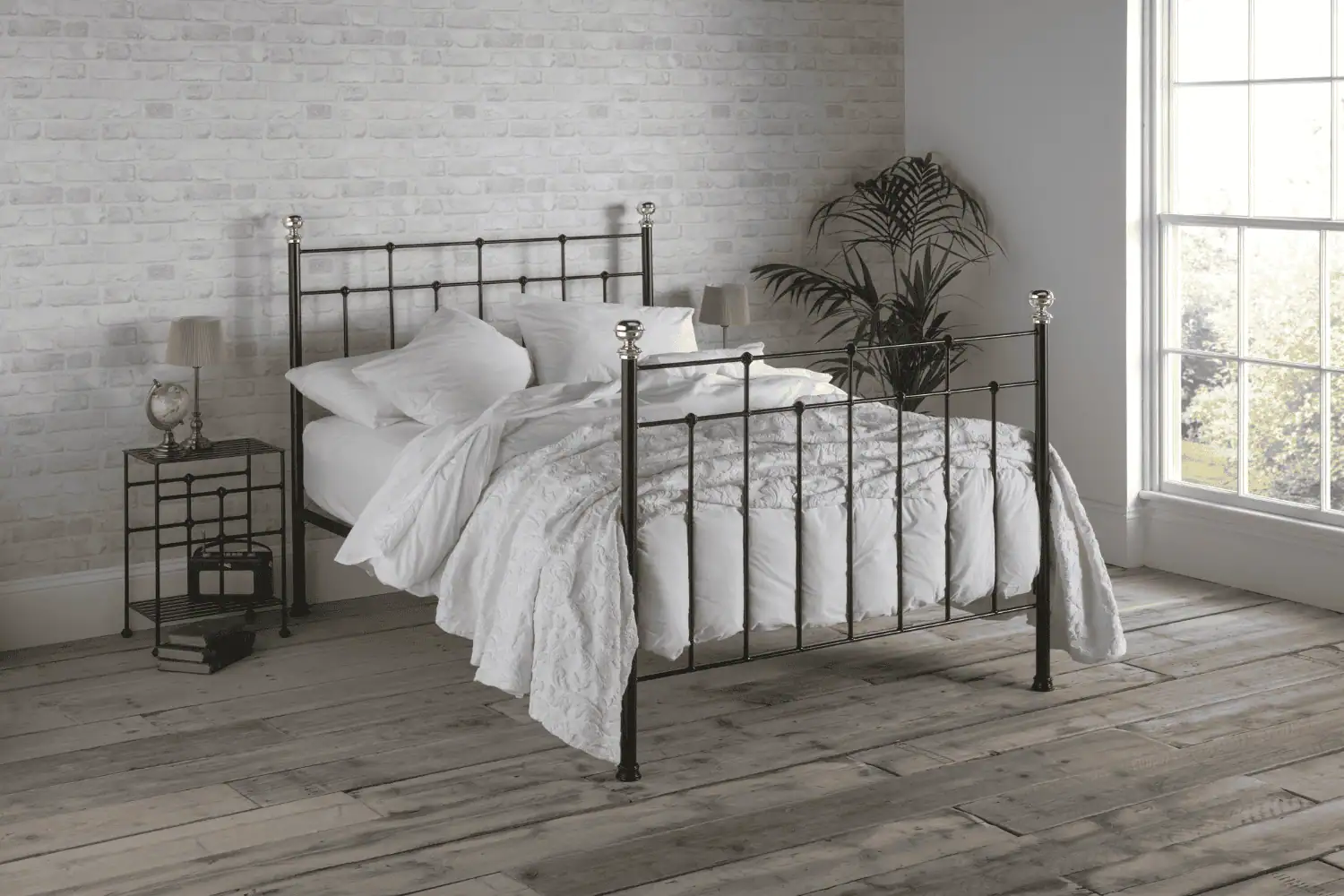 Emma black iron bed in cozy interior