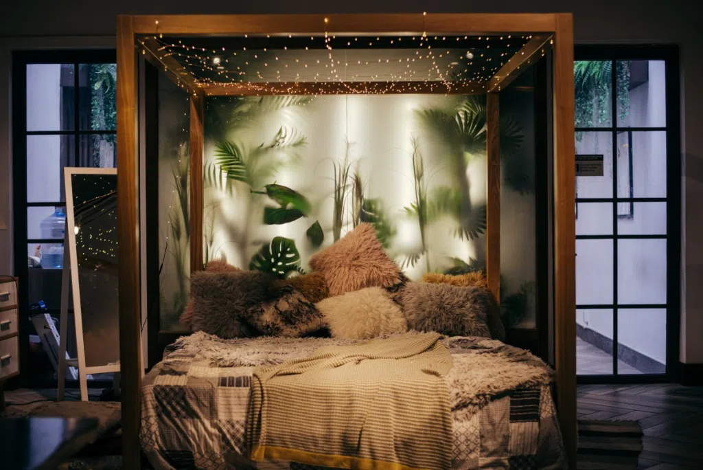 Modern canopy bed with fairy light canopy
