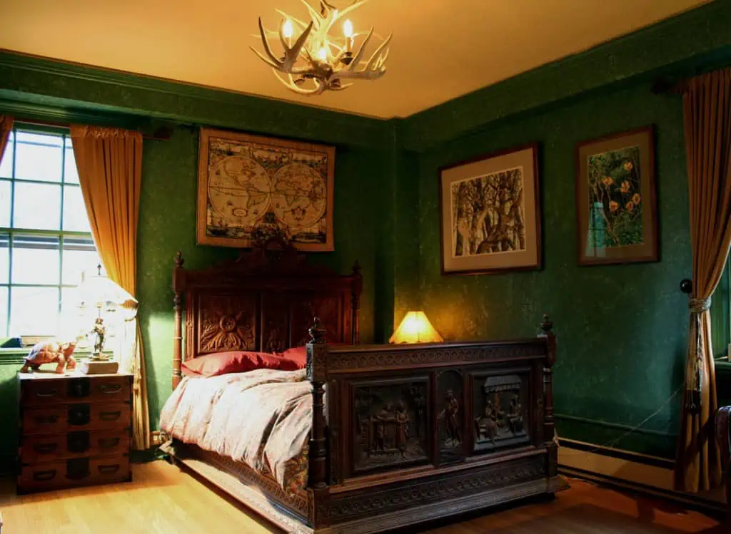 Ornate wooden bed in gothic style