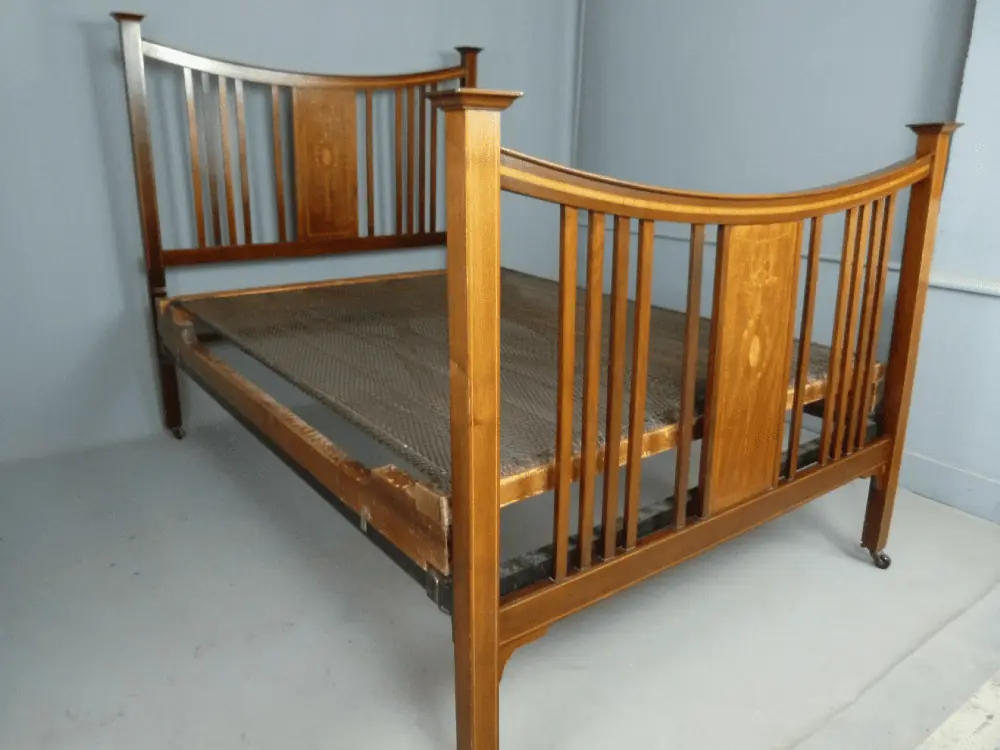 Vintage wooden bedstead with spring base