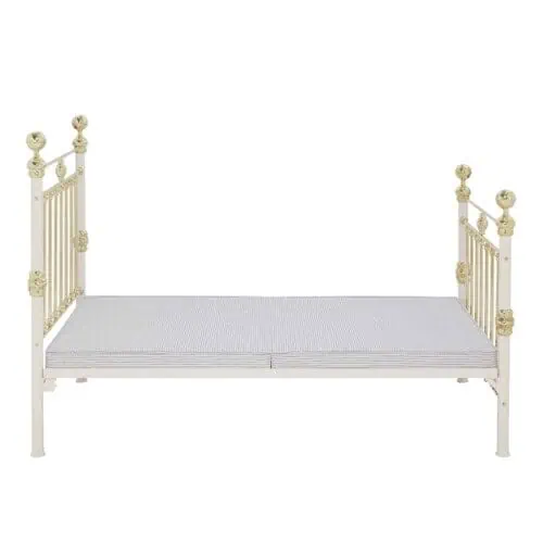platform top base on victorian style iron and brass bed