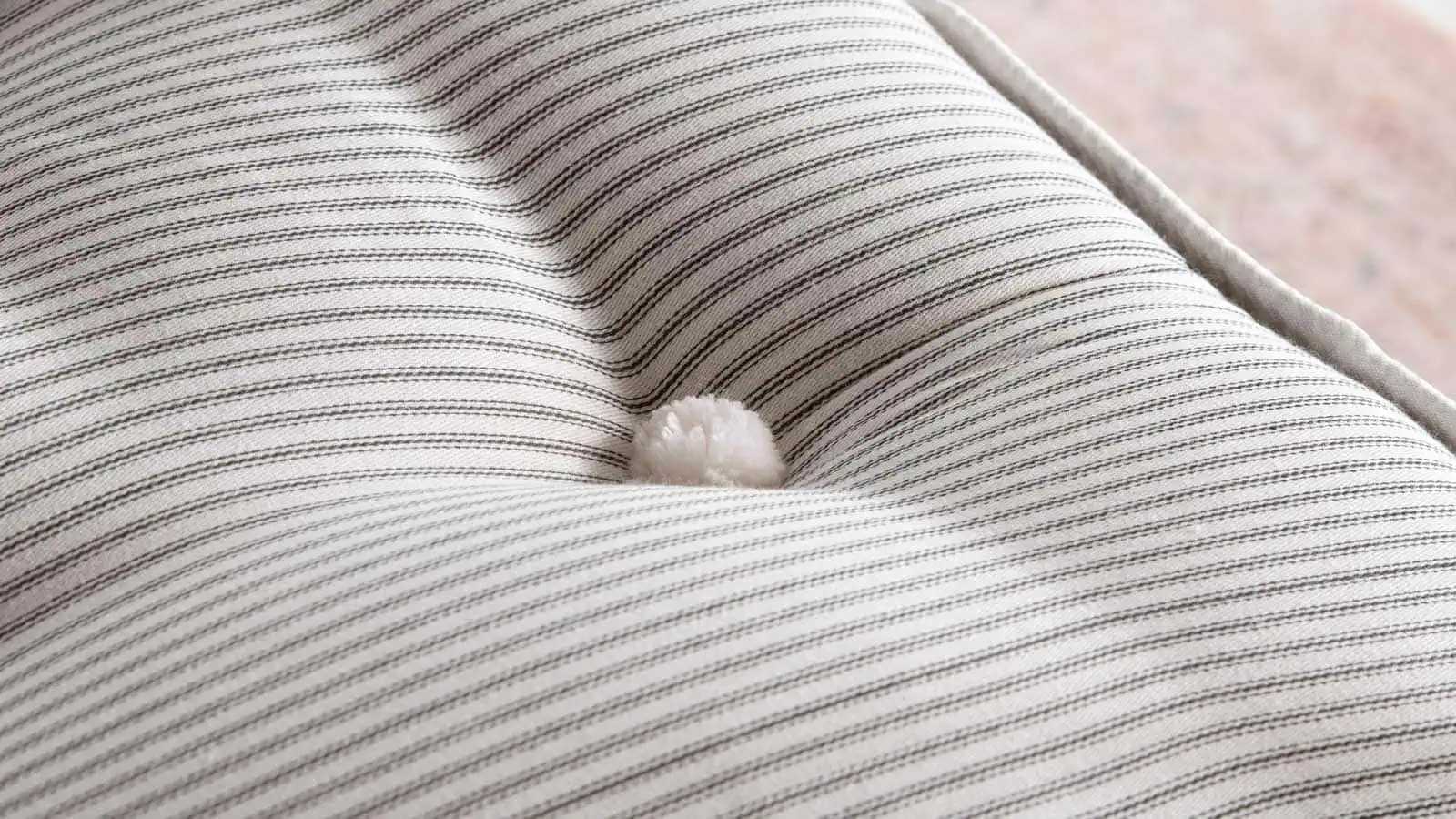 NC-2000-Tuft_Web natural fibre mattress tufted with woollen pom pom style tuft