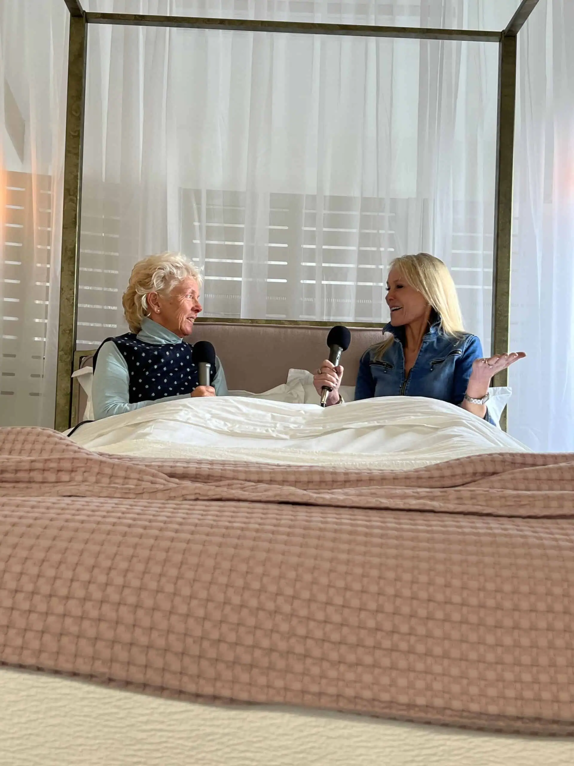 Amanda Oldfield and Lee Lovett talking in the Aurora bed