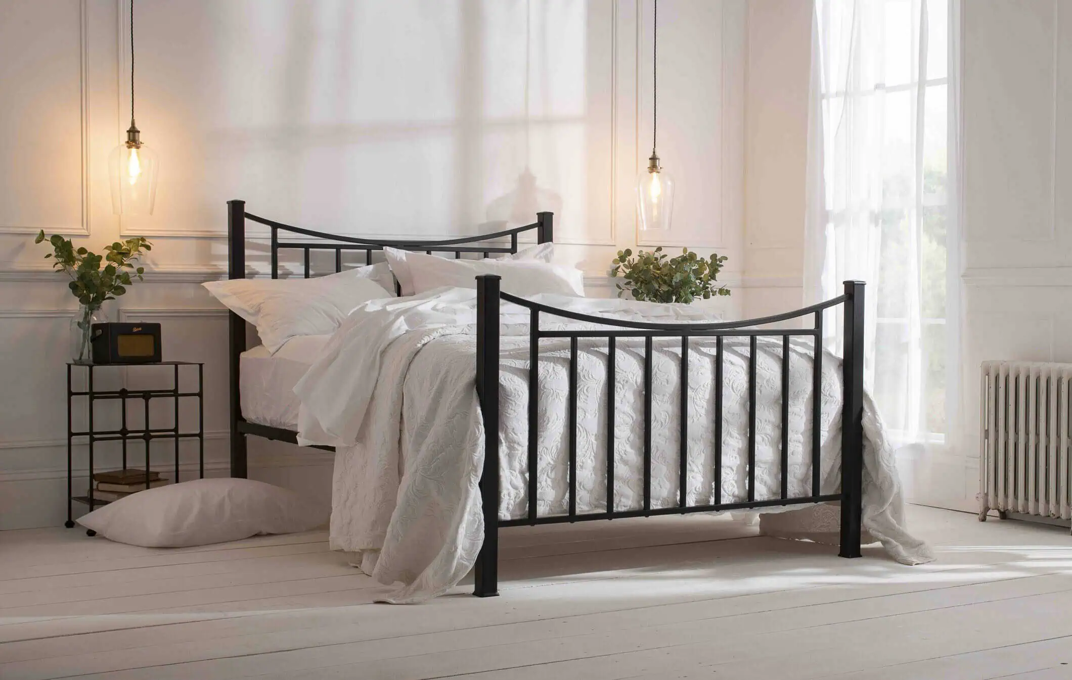 Inca iron bed with hanging glass pendants bedroom lighting