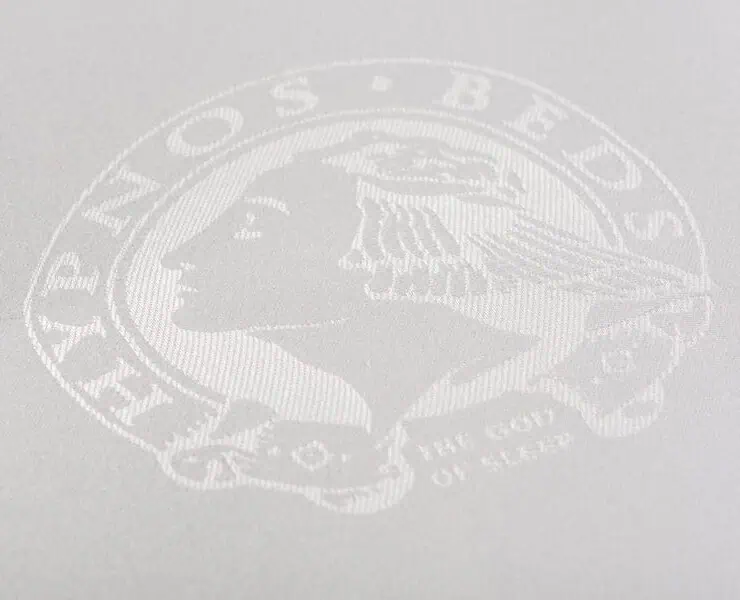 Hypnos mattress embroidered logo white