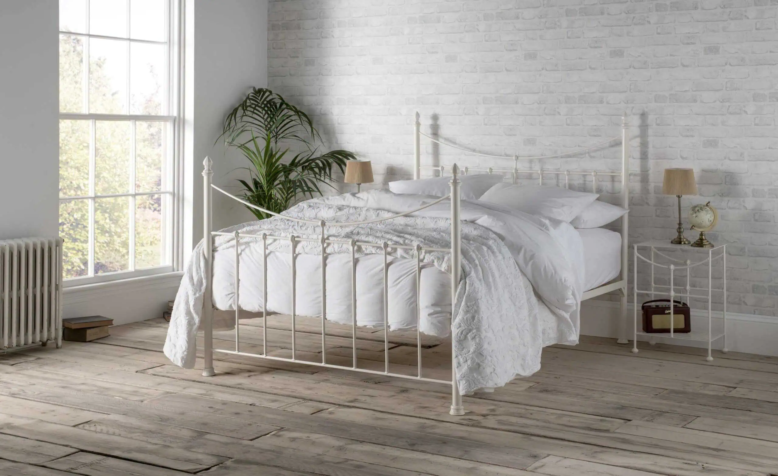 Emily iron bed in ivory with white bedding