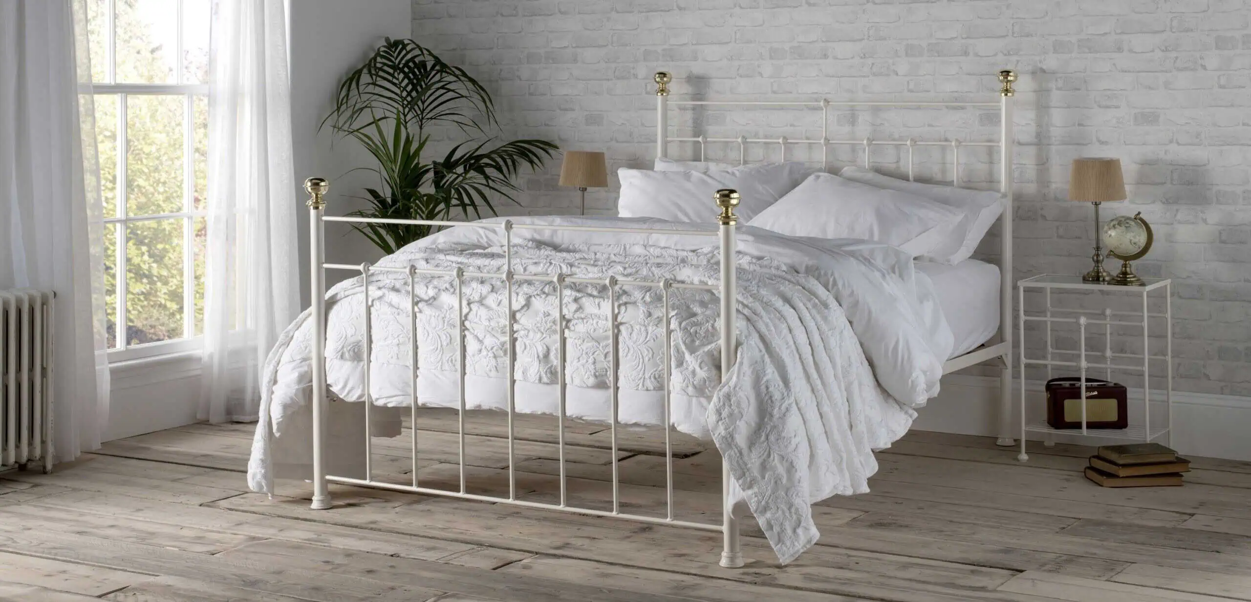 Charlotte iron bed with white bedding