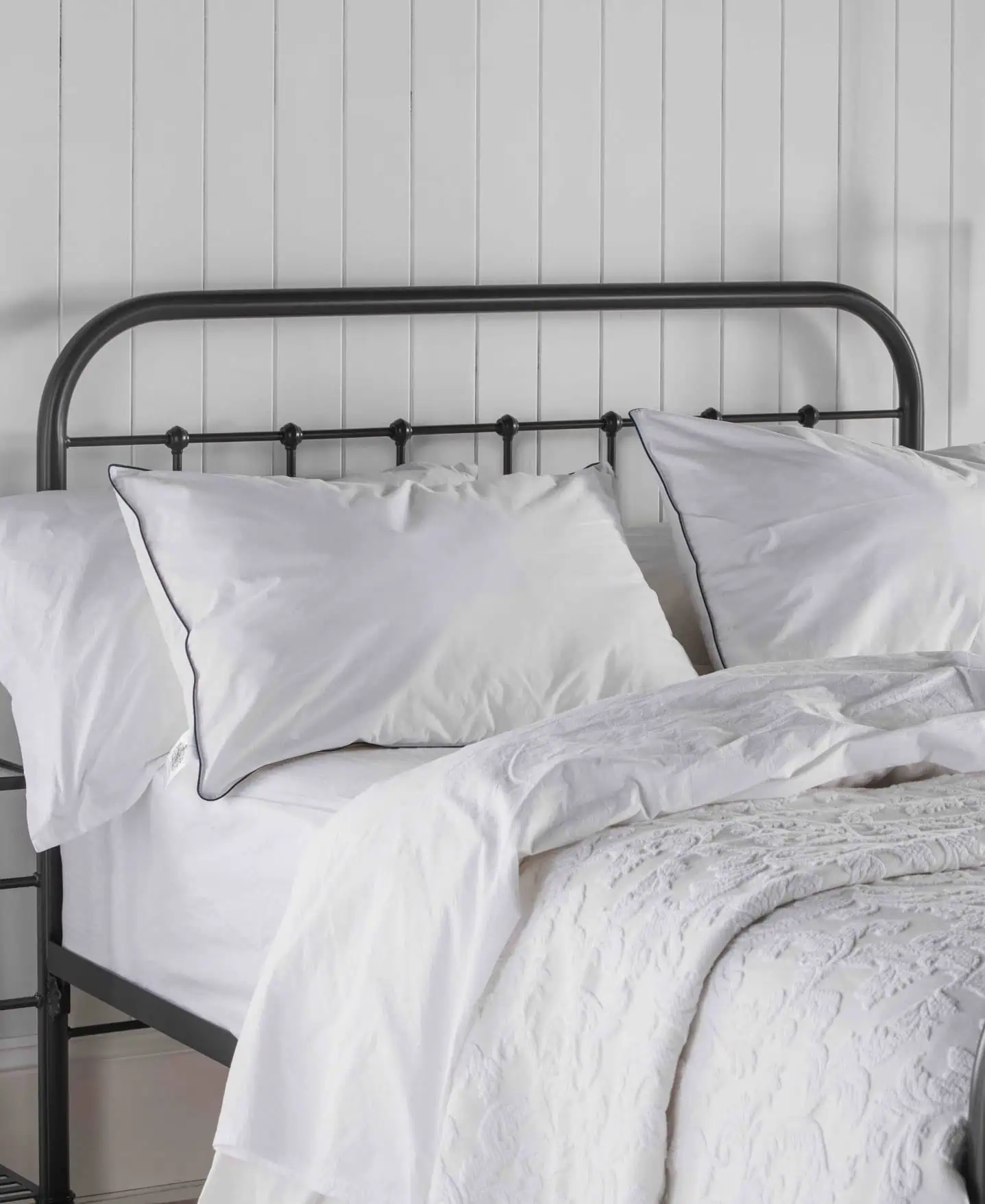 Sandringham wool pillows on Archie iron bed