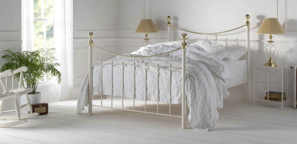 Cottage Style Victoria iron and brass bed in white with brass finials