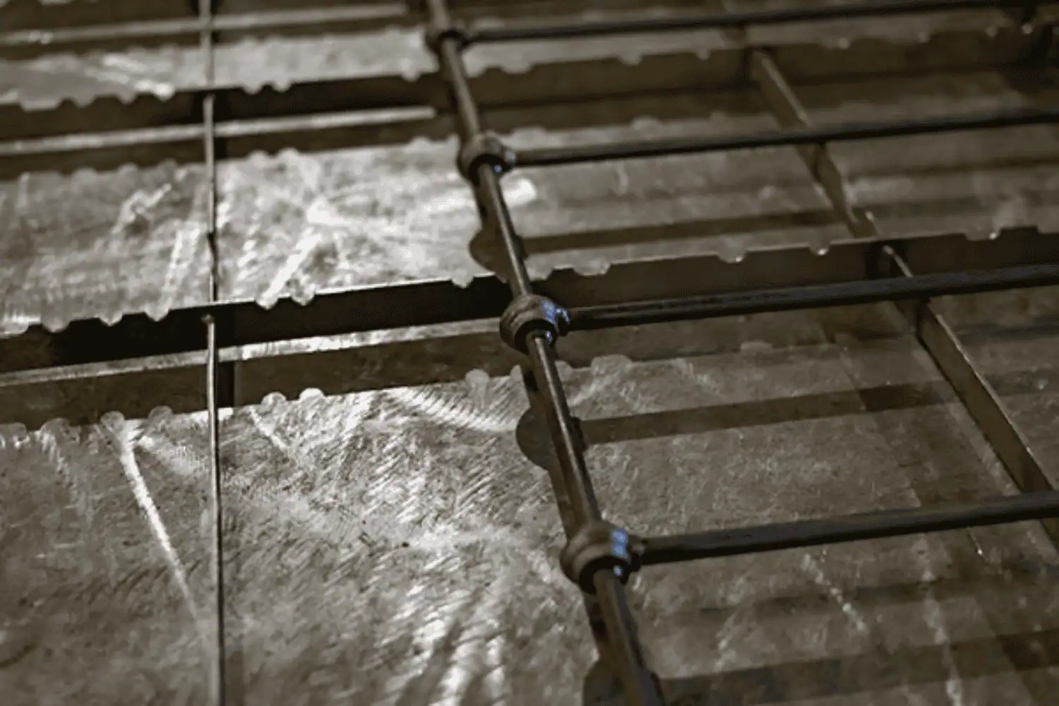 Close-up of bespoke wrought iron bed frame in the making at our Norfolk workshop