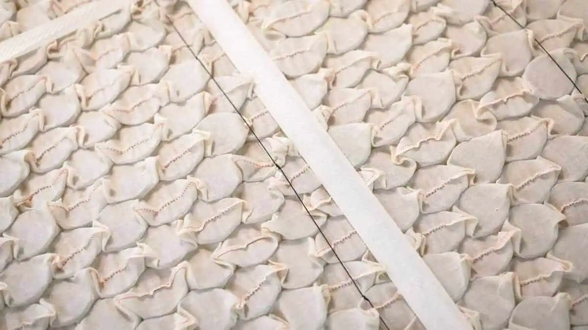 British wool mattress with hand-nested calico pocket springs for breathable natural support