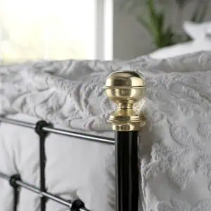 Isaac iron bed finial in brass
