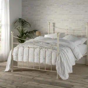 Lily iron bed in white with round finials