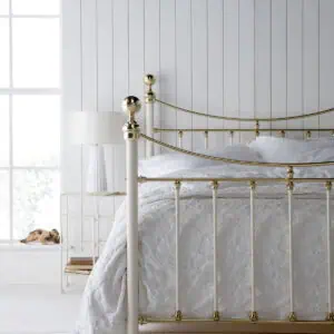 Lottie brass bed in ivory with brass finials