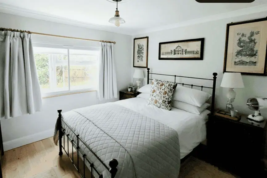 Iron bed frame in a bedroom