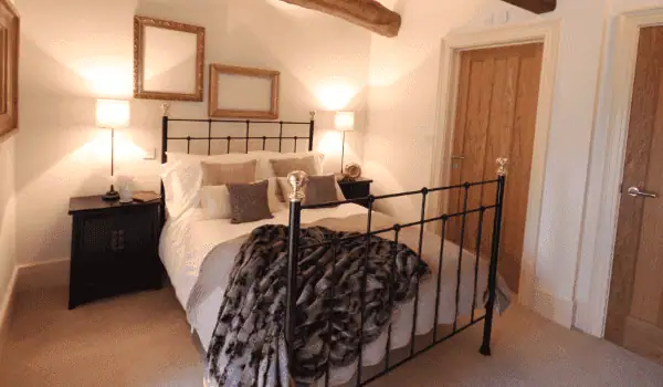 Iron Bed in Cozy Interior